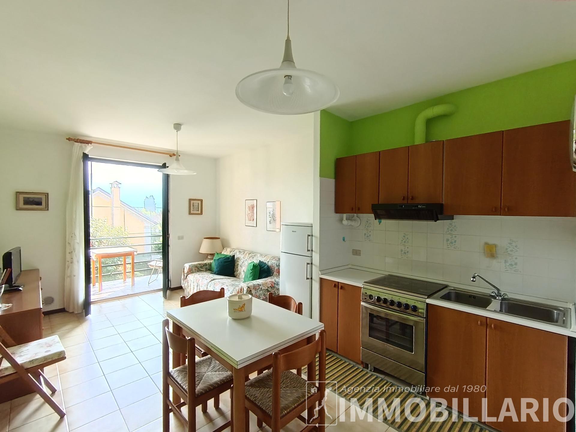 Bilocale con terrazzo a 100 m dal lago Gravedona ed Uniti 1